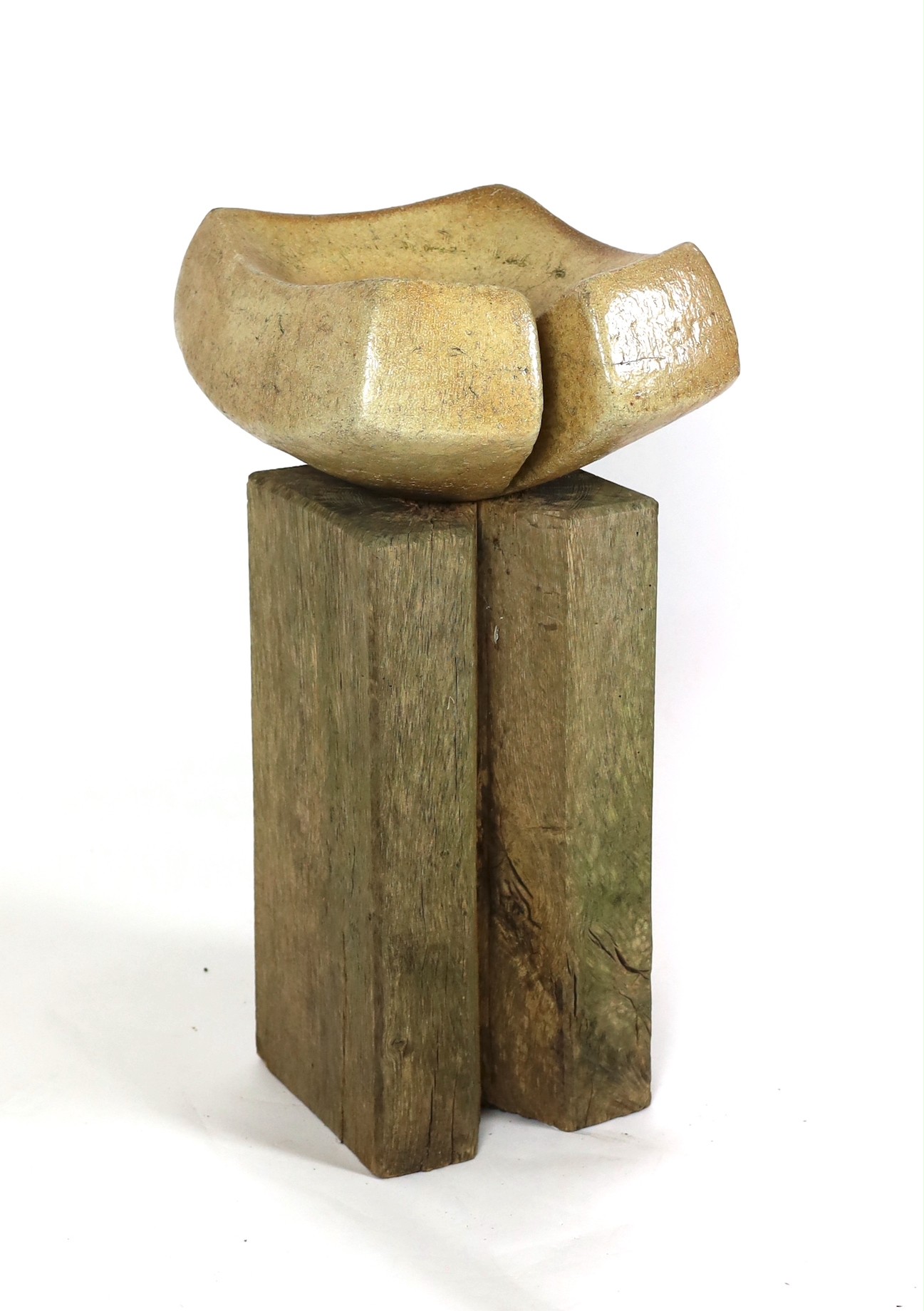 Sarah Walton (b.1945), a large salt glaze stoneware bird bath on a wood pedestal, total dimensions 42cm wide 82cm high